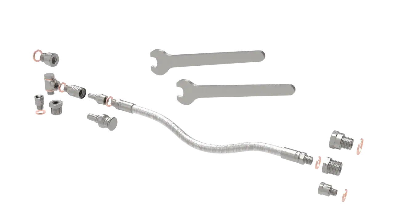 Exploded view of flexible hose and fittings with wrenches.
